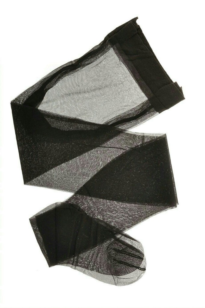 Sheer black stockings — folded